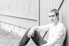 Yearbook photos at home in the fall. A boy with his dog. Class o