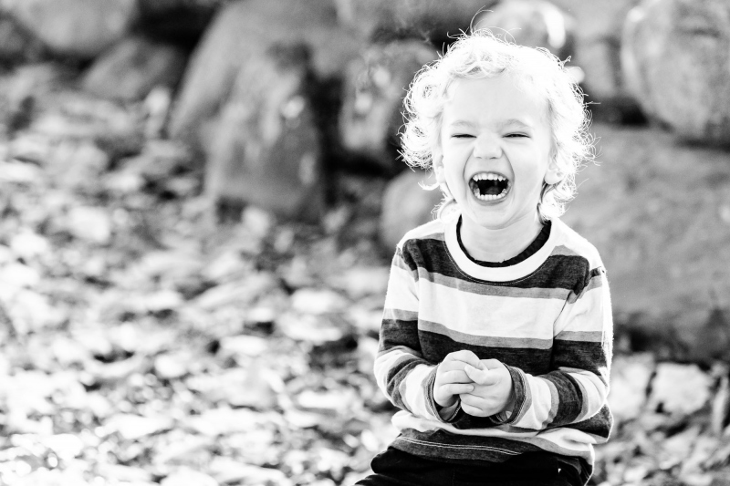 Mom , Dad and toddler son enjoy the scenery on a crisp fall monr