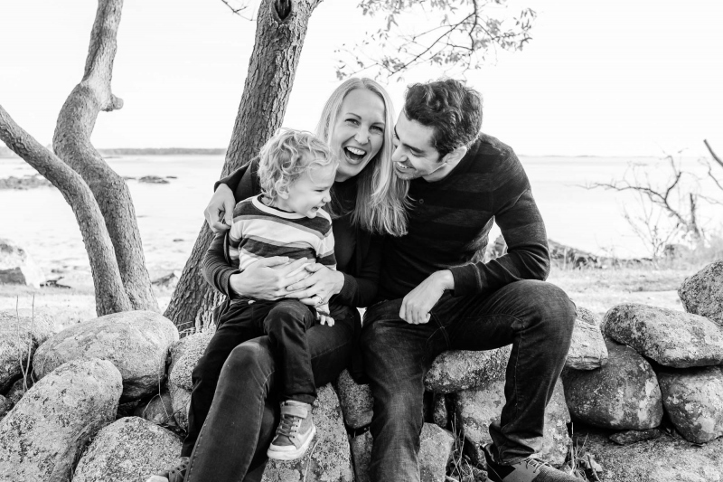 Mom , Dad and toddler son enjoy the scenery on a crisp fall monr