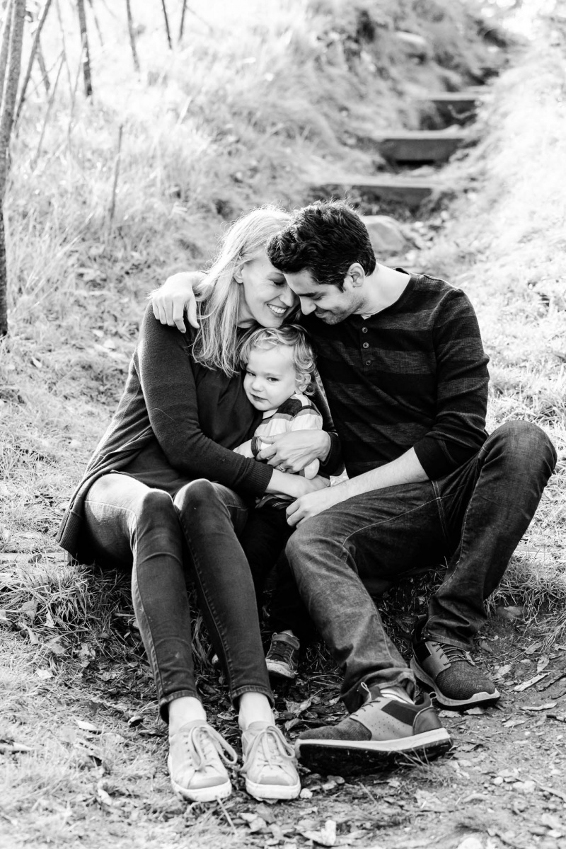 Mom , Dad and toddler son enjoy the scenery on a crisp fall monr