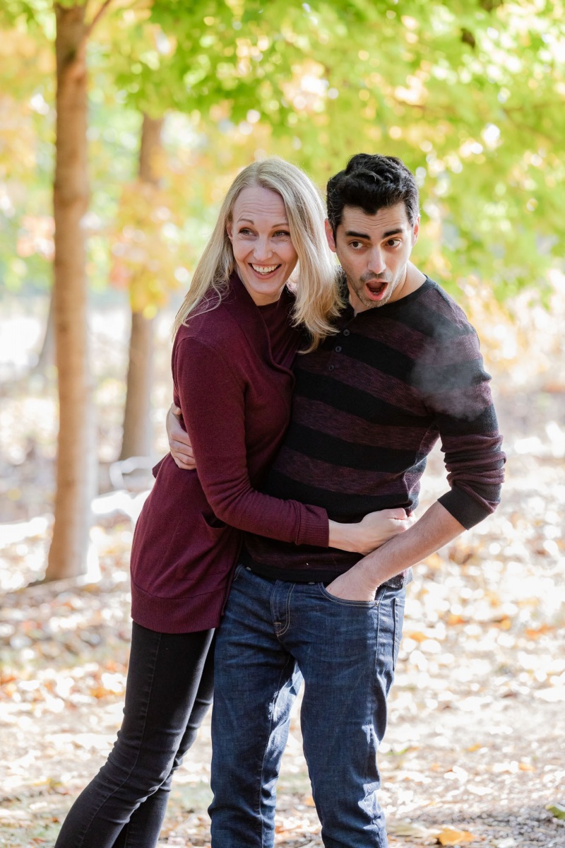 Mom , Dad and toddler son enjoy the scenery on a crisp fall monr