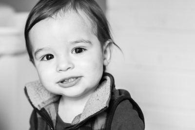 Baby Brother's First Birthday - Camp themed first birthday session - moose rocking chair - black and red plaid - big sister with pink bow