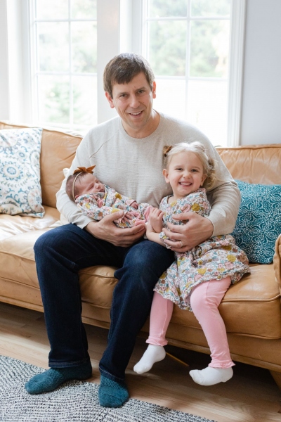 Family of three becomes a family of four with the addition of ba
