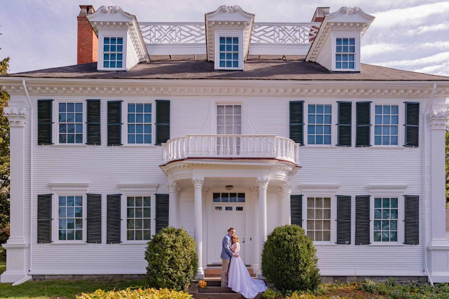Classic wedding portrait in front of Governor John Langdon House in Portsmouth, New Hampshire